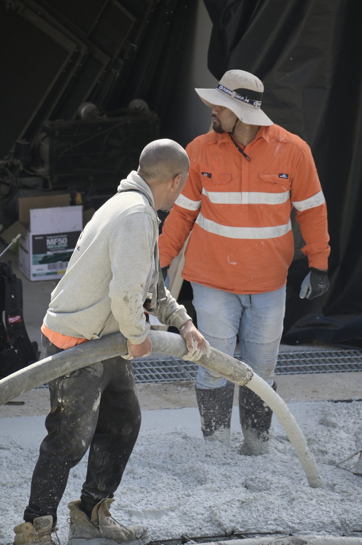 TT Constructions crew pouring concrete on site