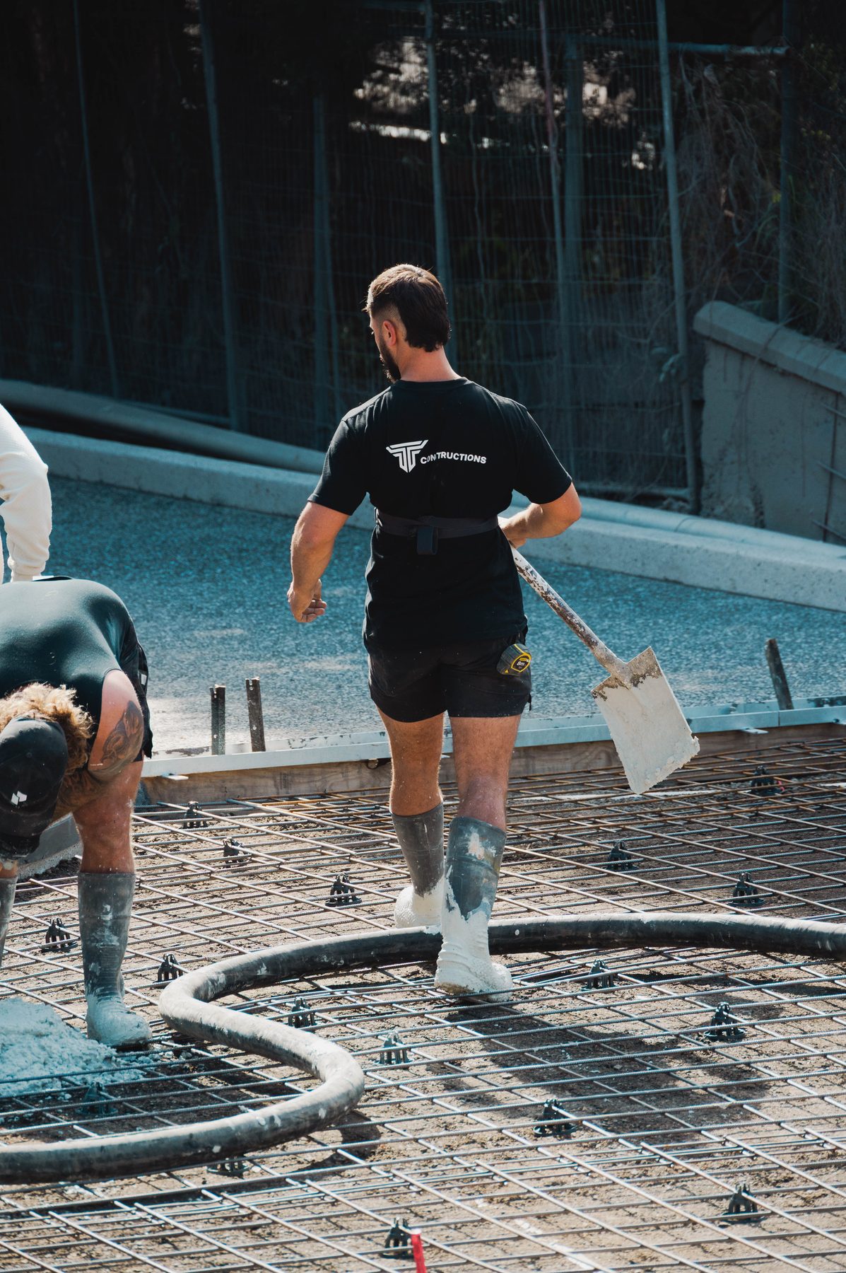 Tradesman on a reinforcement mesh pour, TT Constructions